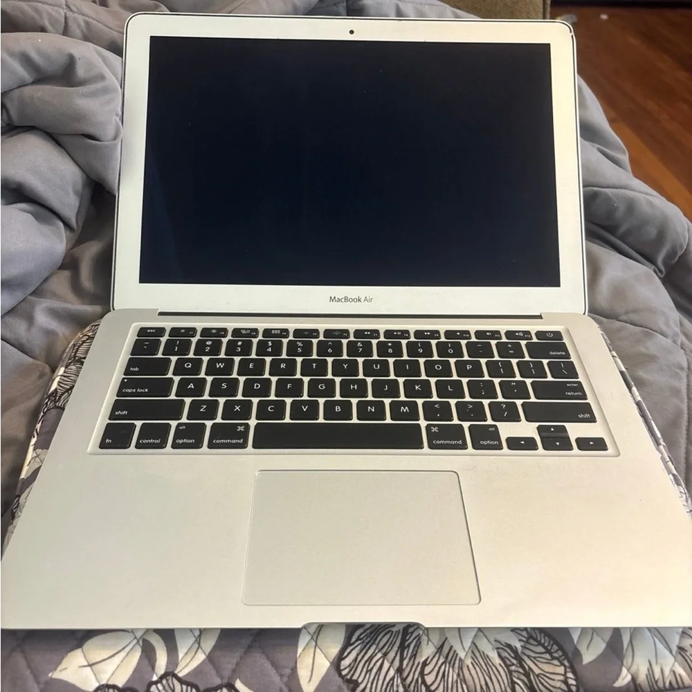 Apple Silver MacBook Laptop Sleek Design.